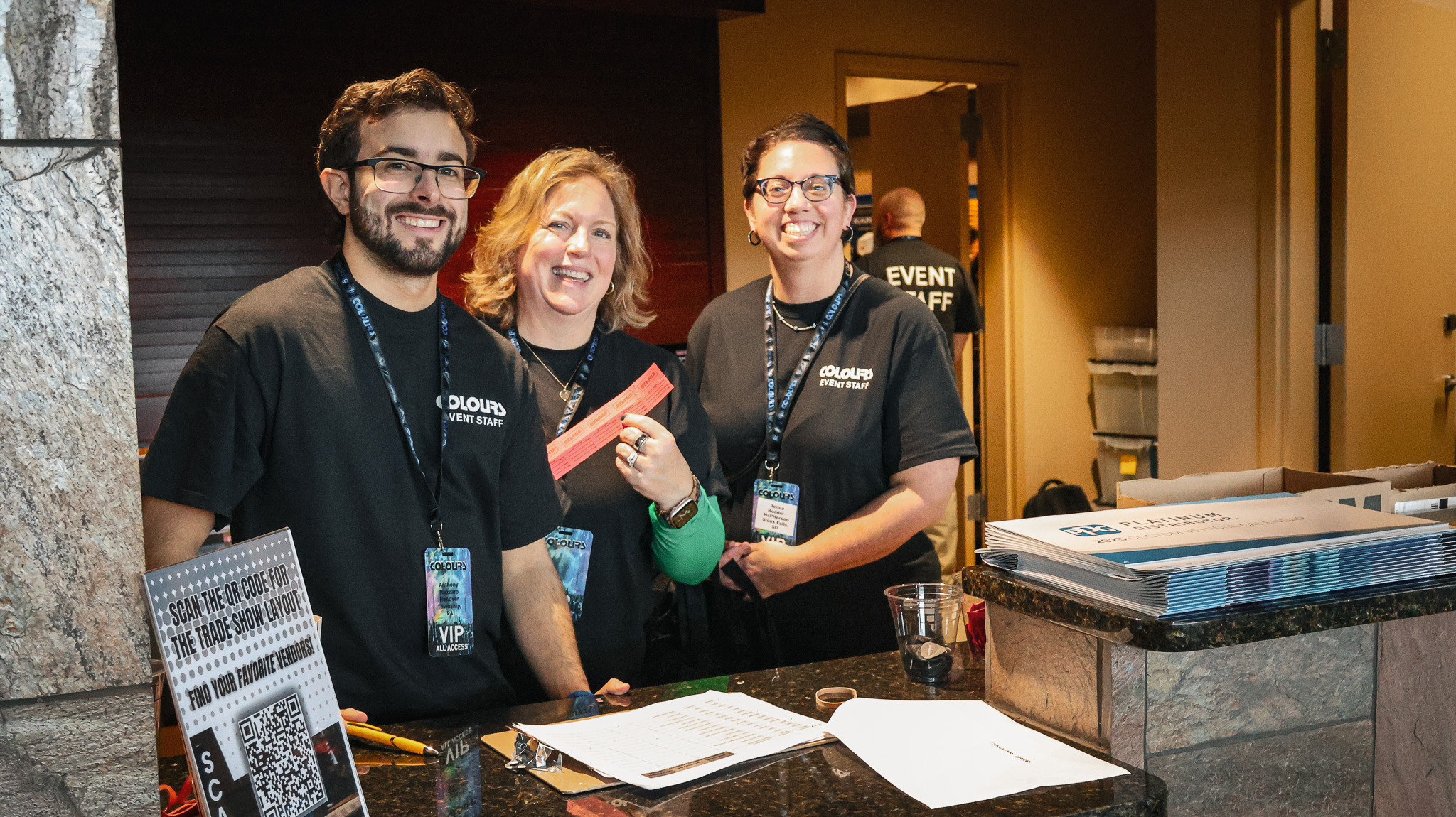 Colours Staff pose at Registration Desk at Kalahari Resort